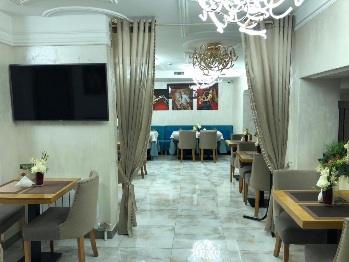 Grace Point Hotel Astana Zimmer foto